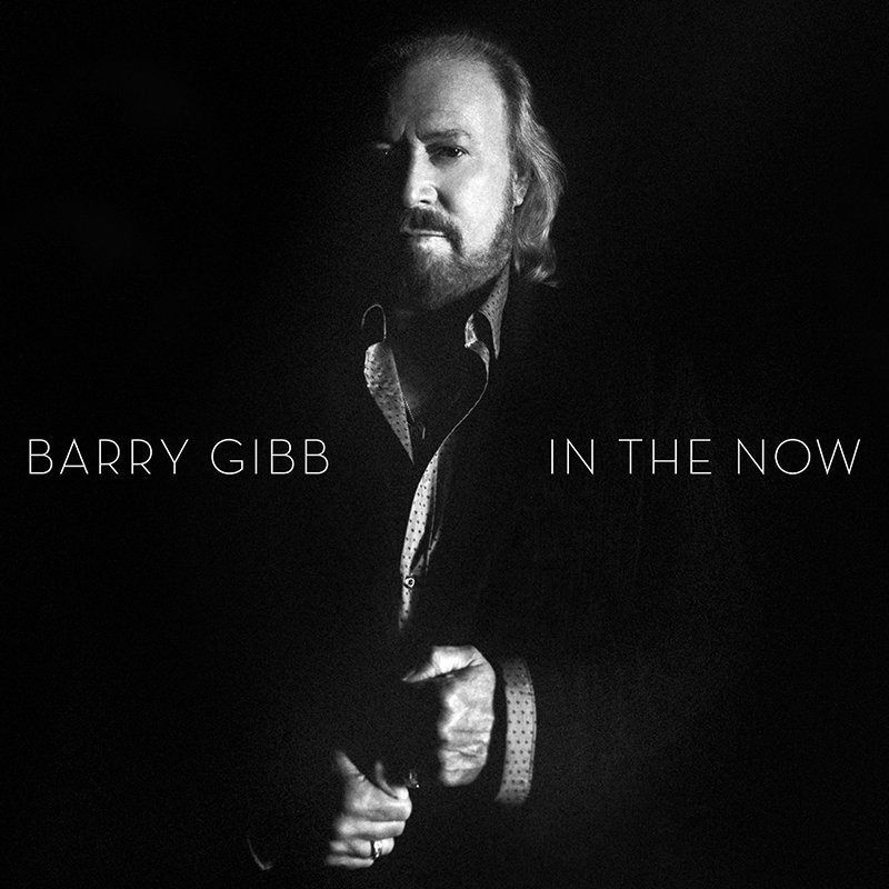Black and white portrait of Barry Gibb with the album title "In the Now" and his name.