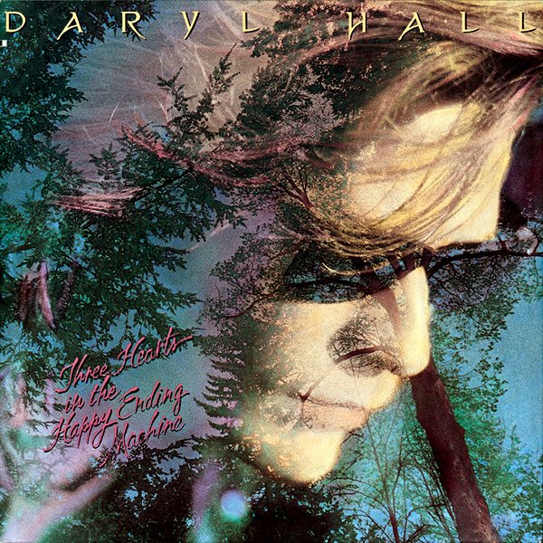 Album cover with a double exposure of a woman's face and trees, featuring the text "Daryl Hall" at the top and "Syreeta — In the Happy Ending Machine" at the bottom.