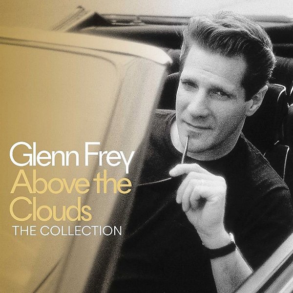 Album cover for Glenn Frey's 'Above the Clouds: The Collection' featuring a black and white photo of Glenn Frey holding glasses, looking thoughtfully to the side.