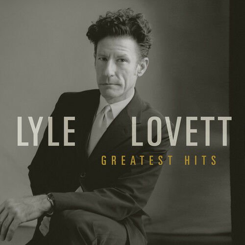 Black and white portrait of musician Lyle Lovett in a suit, with text 'Lyle Lovett Greatest Hits' on the image.